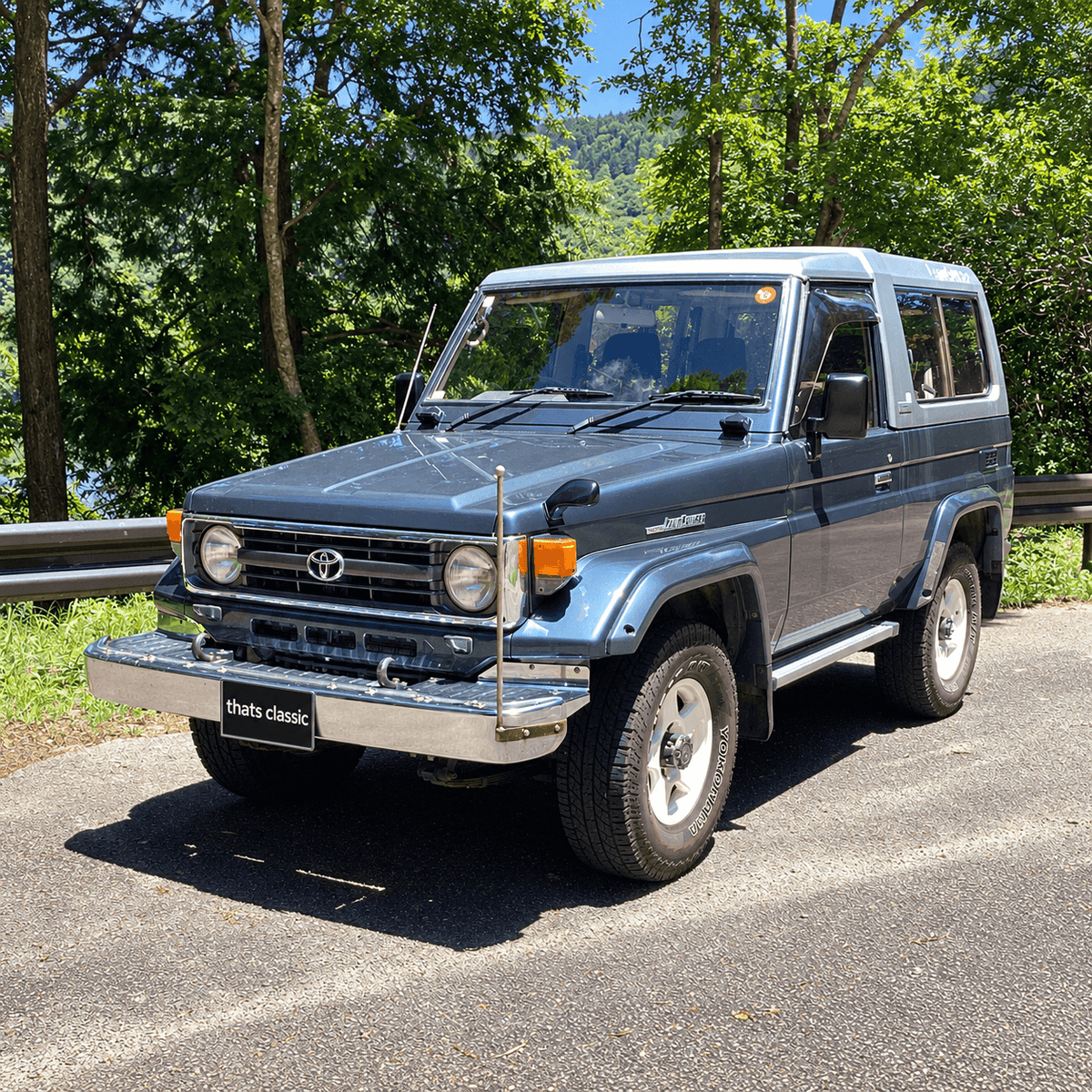 1995 Toyota Land Cruiser HZJ73 ZX in blue with grey FRP top